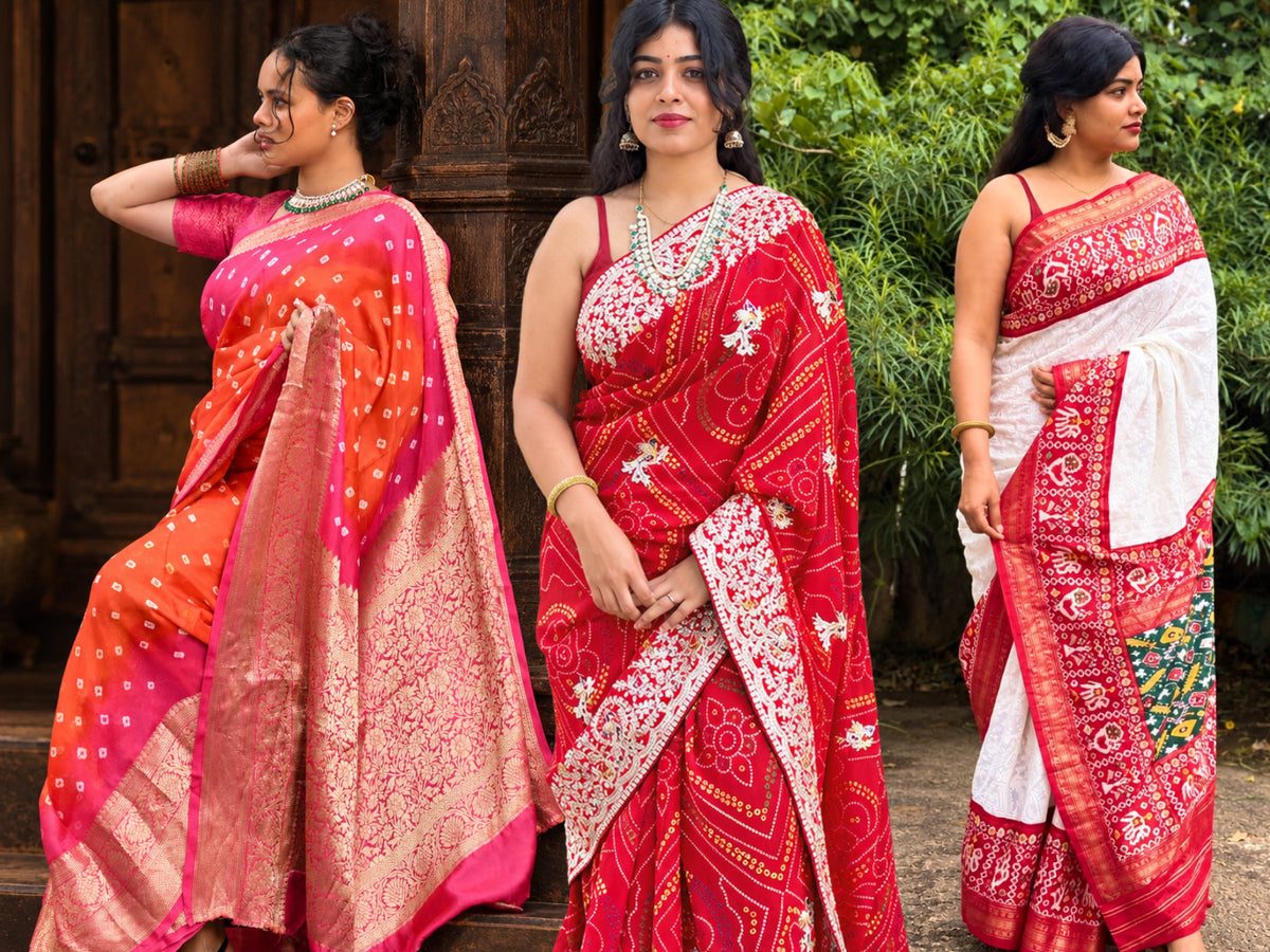 Three women modelling pink and orange, red, and white sarees with intricate patterns and decorative borders.